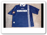 German club FC Schalke 04 won its first major European trophy in 1997 by defeating Inter Milan for the Uefa Cup. American international Thomas Dooley wore this jersey during the Championship season. He captained the U.S. World Cup team in 1998. 