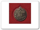 The expansion club Chicago Fire began to add trophies from the start. They won the 1998 MLS Cup as well as the U.S. Open Cup in their first season. This was the winner's medal from MLS Cup'98. 
